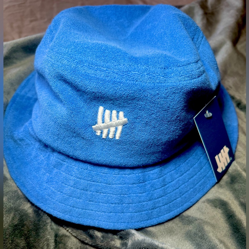 Undefeated blue terry cloth bucket hat. NWT